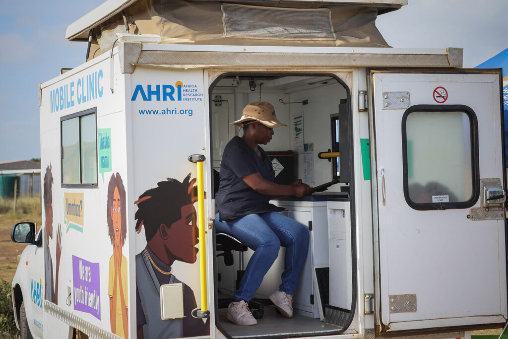 Nurse Cabangeni Shange waits inside one of AHRIÕs mobile clinics in a rural community near Matubatuba, Kwazulu Natal, South Africa, 20 April 2026. The Africa Health Research Institute (AHRI) utilizes mobile clinics, particularly in KwaZulu-Natal, South Africa, to deliver, on-demand sexual/reproductive health services, HIV testing/treatment, and TB screening to remote areas. These nurse-led mobile units increase access for underserved populations. PHOTO: HALDEN KROG